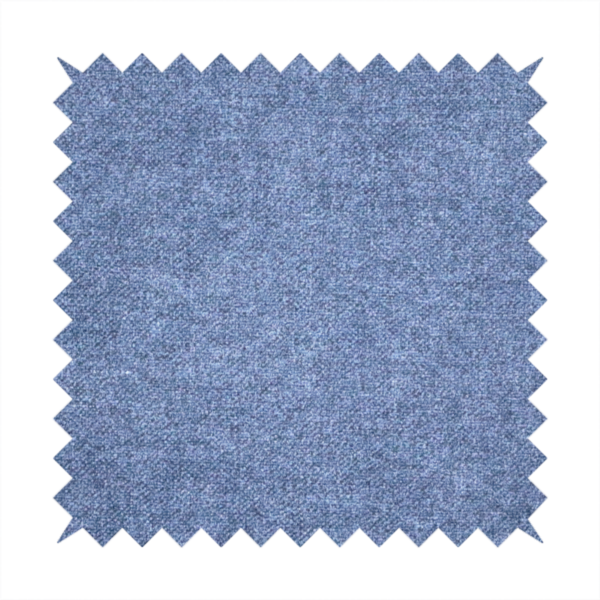 A fine, woven upholstery fabric in a deep, classic navy blue tone, featuring a consistent and textured surface pattern.