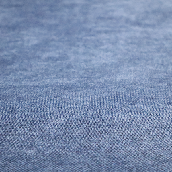 A fine, woven upholstery fabric in a deep, classic navy blue tone, featuring a consistent and textured surface pattern.