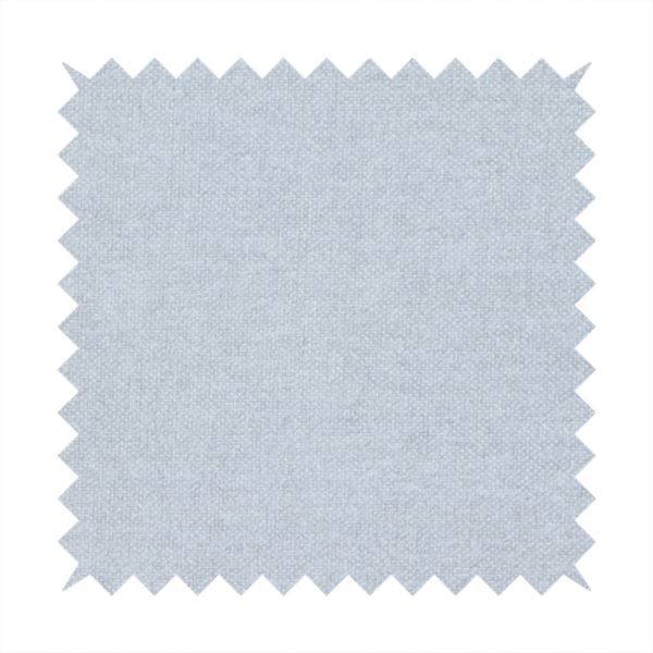 A fine, woven upholstery fabric in a subtle, cool-toned pale grey or off-white, featuring a consistent and textured surface pattern.