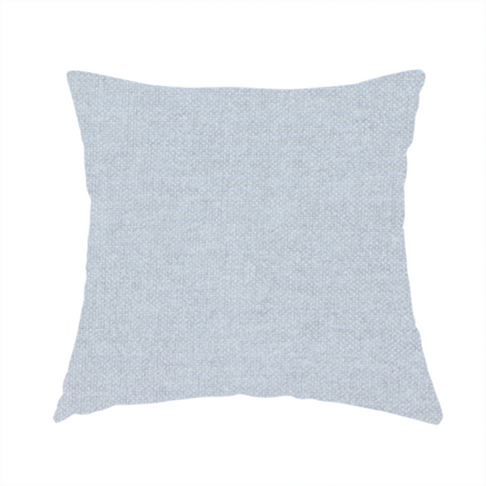 The fabric used to create this handmade cushion is a fine, woven upholstery fabric in a subtle, cool-toned pale grey or off-white, featuring a consistent and textured surface pattern.