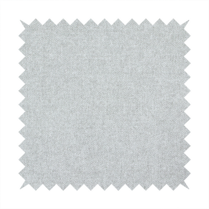 A fine, woven upholstery fabric in a clean, neutral light grey or soft silver tone, featuring a consistent and textured surface pattern.