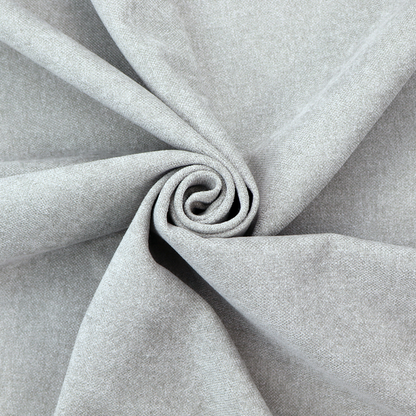 A fine, woven upholstery fabric in a clean, neutral light grey or soft silver tone, featuring a consistent and textured surface pattern.
