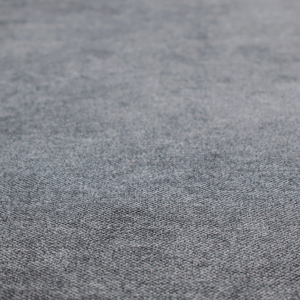 A fine, woven upholstery fabric in a deep, moody charcoal grey tone, featuring a consistent and textured surface pattern.
