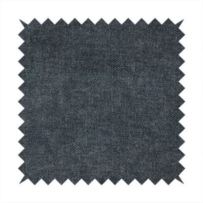 A fine, woven upholstery fabric in a dark, sophisticated slate grey or near-black tone, featuring a consistent and textured surface pattern.