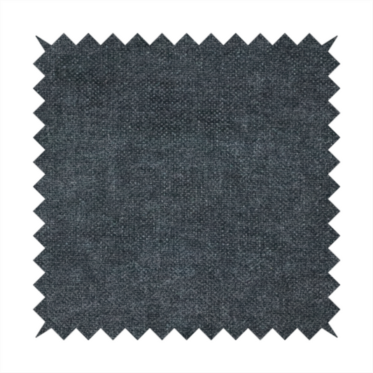 A fine, woven upholstery fabric in a dark, sophisticated slate grey or near-black tone, featuring a consistent and textured surface pattern.
