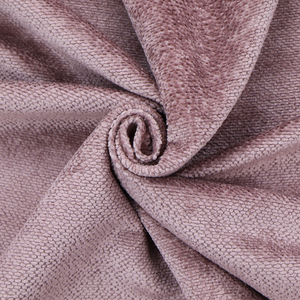 A muted, dusty rose or soft mauve upholstery fabric. It maintains the signature dense, uniform, boucle-style weave seen in the previous samples, featuring small, looped, and nubby yarn fibres that create a soft and tactile surface.
