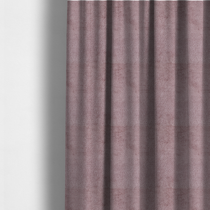 The fabric used to create these made-to-measure curtains is a muted, dusty rose or soft mauve upholstery fabric. It maintains the signature dense, uniform, boucle-style weave seen in the previous samples, featuring small, looped, and nubby yarn fibres that create a soft and tactile surface.