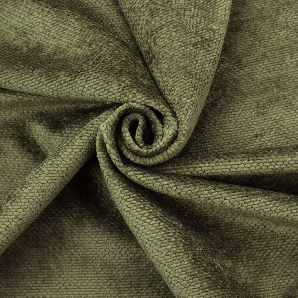 A deep, earth-toned olive green upholstery fabric. It continues the signature dense, uniform, boucle-style weave of the collection, created with small, looped, and nubby yarn fibres that offer a soft and tactile surface.
