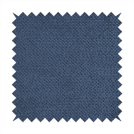 A deep, rich navy blue upholstery fabric. It features the signature dense, uniform, boucle-style weave of the collection, composed of small, looped, and nubby yarn fibres that create a soft and tactile surface.