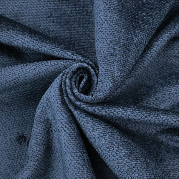 A deep, rich navy blue upholstery fabric. It features the signature dense, uniform, boucle-style weave of the collection, composed of small, looped, and nubby yarn fibres that create a soft and tactile surface.