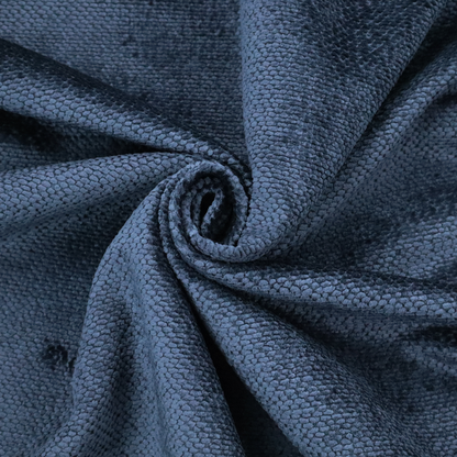 A deep, rich navy blue upholstery fabric. It features the signature dense, uniform, boucle-style weave of the collection, composed of small, looped, and nubby yarn fibres that create a soft and tactile surface.