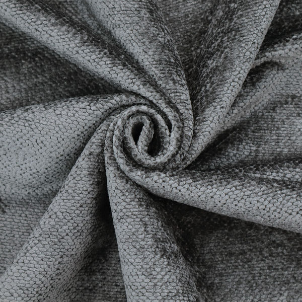 A deep, dark grey or graphite-toned upholstery fabric. It features the signature dense, uniform, boucle-style weave of the collection, composed of small, looped, and nubby yarn fibres that create a soft and tactile surface.