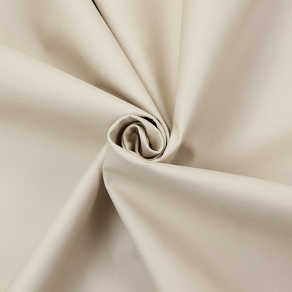 A solid champagne-coloured Hallstatt faux leather fabric texture with a smooth, fine finish.