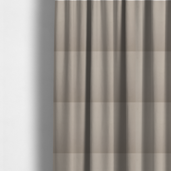 The fabric used to create these made-to-measure curtains is a solid taupe-coloured Hallstatt faux leather fabric texture with a smooth, fine finish.