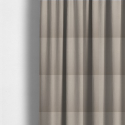 The fabric used to create these made-to-measure curtains is a solid taupe-coloured Hallstatt faux leather fabric texture with a smooth, fine finish.