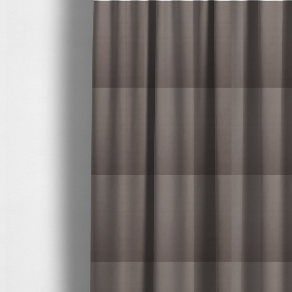 The fabric used to create these made-to-measure curtains is a solid brown-coloured Hallstatt faux leather fabric texture with a smooth, fine finish.