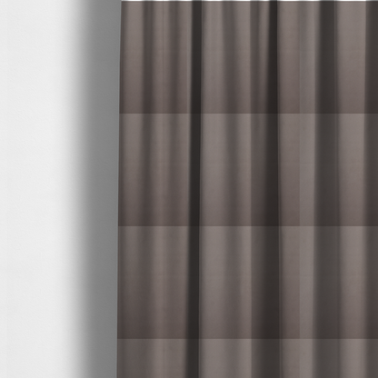 The fabric used to create these made-to-measure curtains is a solid brown-coloured Hallstatt faux leather fabric texture with a smooth, fine finish.