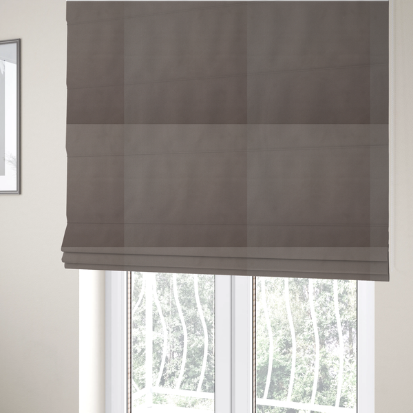 The fabric used to create these Roman blinds is a solid brown-coloured Hallstatt faux leather fabric texture with a smooth, fine finish.