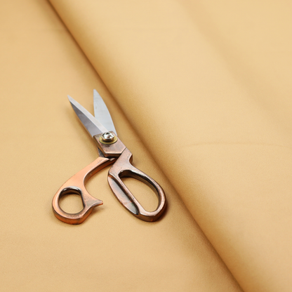 A solid yellow-coloured Hallstatt faux leather fabric texture with a smooth, fine finish.