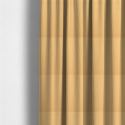 The fabric used to create these made-to-measure curtains is a solid yellow-coloured Hallstatt faux leather fabric texture with a smooth, fine finish.