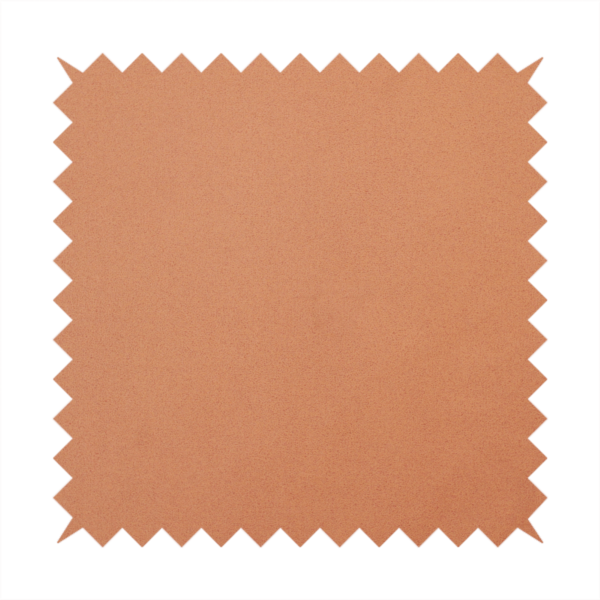 A solid orange-coloured Hallstatt faux leather fabric texture with a smooth, fine finish.