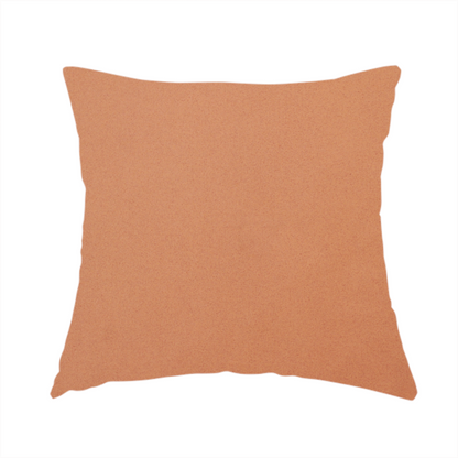 The fabric used to create this handmade cushion is a solid orange-coloured Hallstatt faux leather fabric texture with a smooth, fine finish.