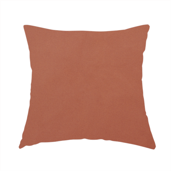 The fabric used to create this handmade cushion is a solid rust-coloured Hallstatt faux leather fabric texture with a smooth, fine finish.