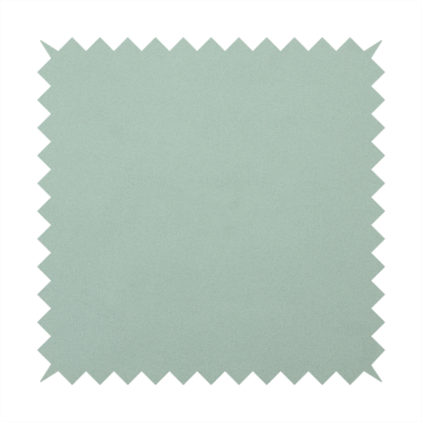 A solid sage green-coloured Hallstatt faux leather fabric texture with a smooth, fine finish.