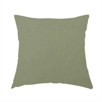 The fabric used to create this handmade cushion is a plain, solid olive green-coloured Hallstatt faux leather fabric texture with a smooth, fine finish.