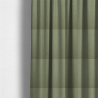 The fabric used to create these made-to-measure curtains is a plain, solid olive green-coloured Hallstatt faux leather fabric texture with a smooth, fine finish.