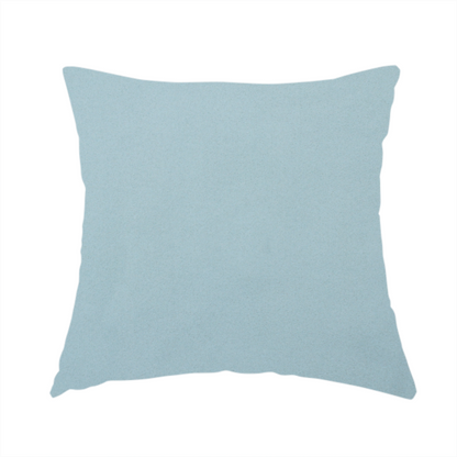 The fabric used to create this handmade cushion is a plain, solid light blue-coloured Hallstatt faux leather fabric texture with a smooth, fine finish.