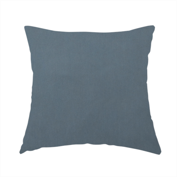 The fabric used to create this handmade cushion is a plain, solid dark blue-coloured Hallstatt faux leather fabric texture with a smooth, fine finish.