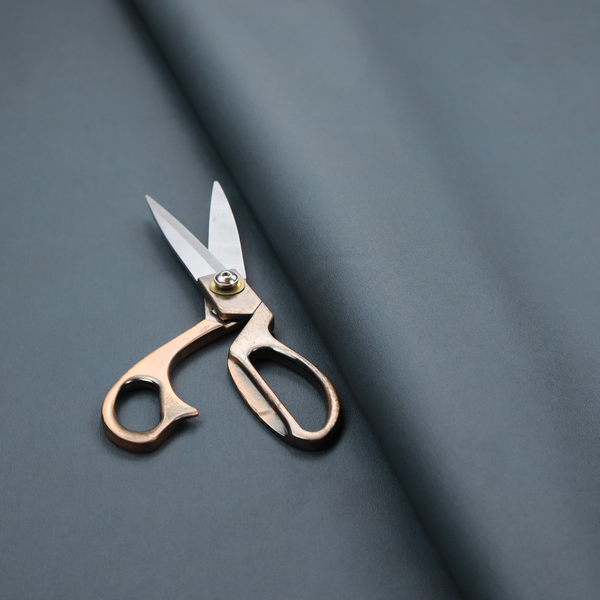 Plain, solid dark blue-coloured Hallstatt faux leather fabric texture with a smooth, fine finish.