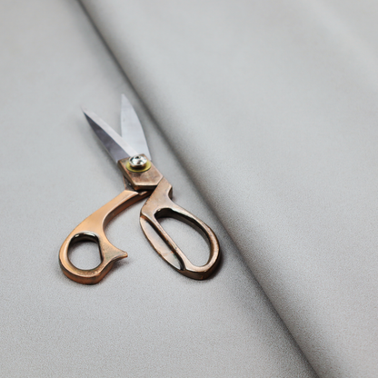 Plain, solid light grey-coloured Hallstatt faux leather fabric texture with a smooth, fine finish.