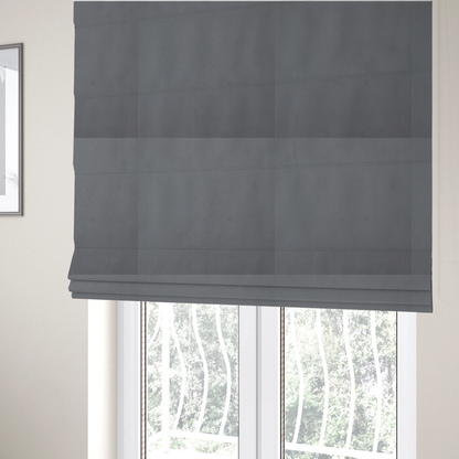 The fabric used to create these Roman blinds is a plain, solid dark grey-coloured Hallstatt faux leather fabric texture with a smooth, fine finish.