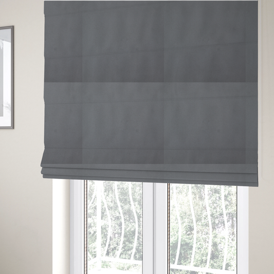 The fabric used to create these Roman blinds is a plain, solid dark grey-coloured Hallstatt faux leather fabric texture with a smooth, fine finish.