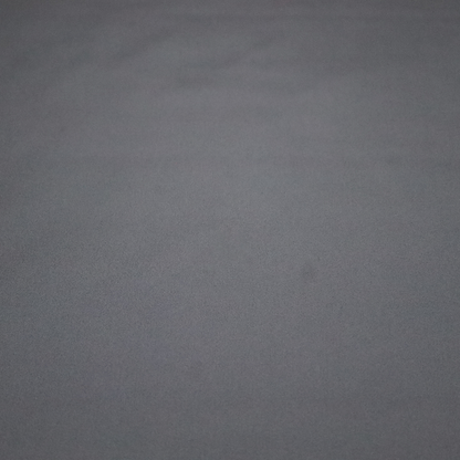 Plain, solid charcoal grey-coloured Hallstatt faux leather fabric texture with a smooth, fine finish.
