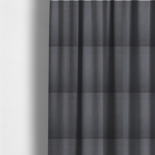 The fabric used to create these made-to-measure curtains is a plain, solid charcoal grey-coloured Hallstatt faux leather fabric texture with a smooth, fine finish.