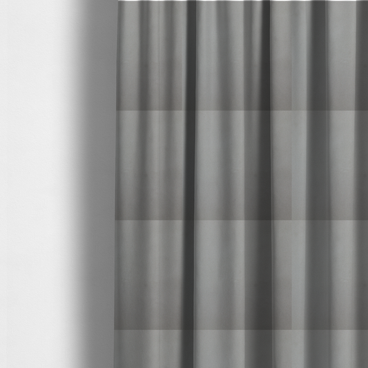 The fabric used to create these made-to-measure curtains is a plain, solid warm grey-coloured Hallstatt faux leather fabric texture with a smooth, fine finish.