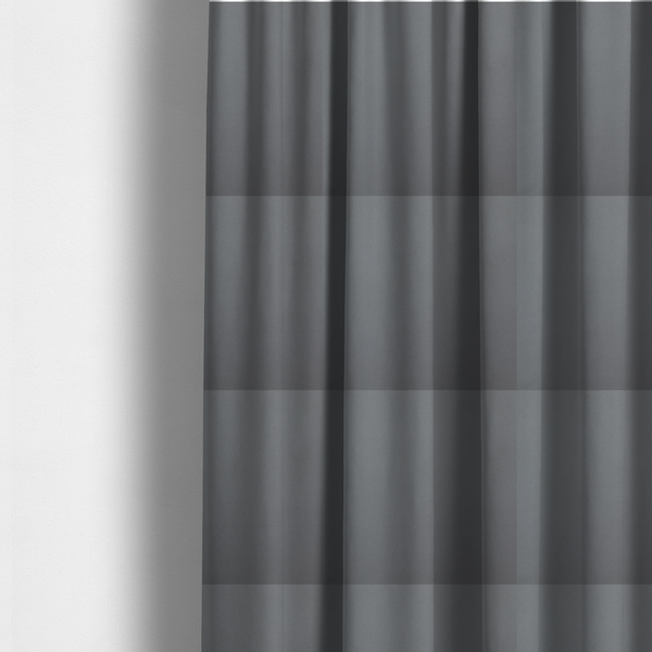 The fabric used to create these made-to-measure curtains is a plain, solid medium grey-coloured Hallstatt faux leather fabric texture with a smooth, fine finish.