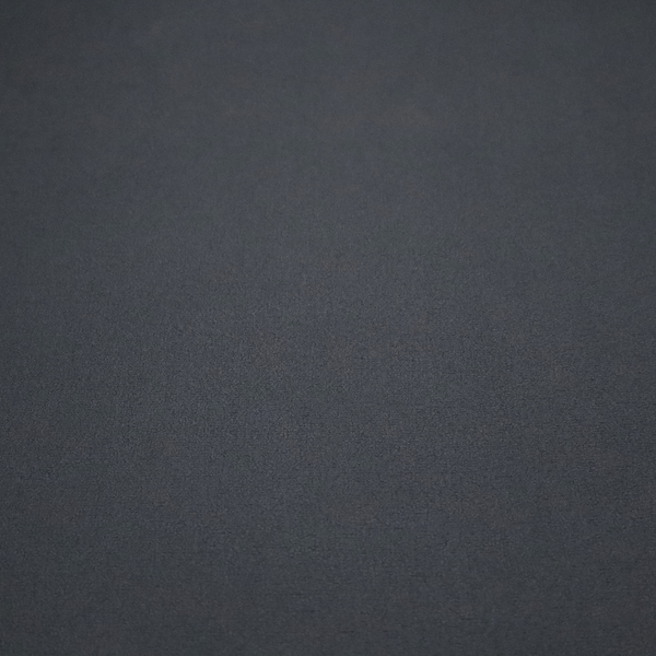 Plain, solid dark slate grey-coloured Hallstatt faux leather fabric texture with a smooth, fine finish.