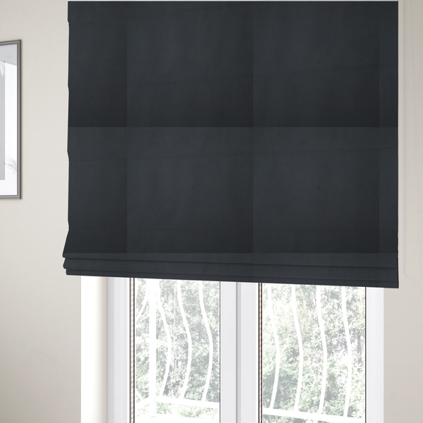 The fabric used to create these Roman blinds is a plain, solid dark slate grey-coloured Hallstatt faux leather fabric texture with a smooth, fine finish.