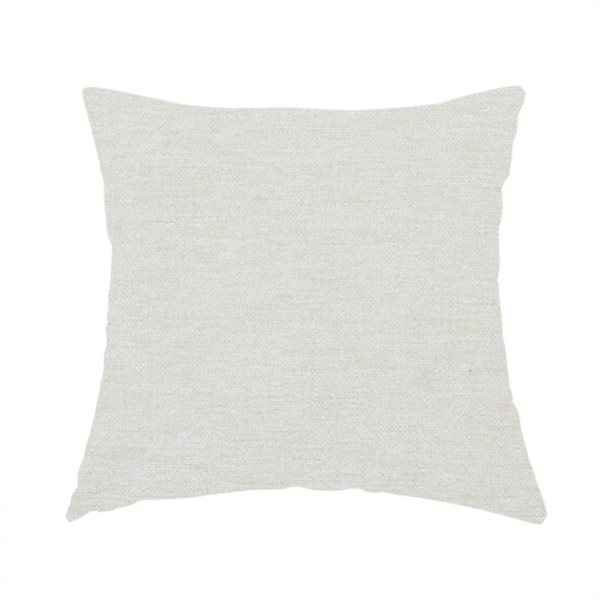 The fabric used to create this handmade cushion is a solid light off-white or cream-coloured woven textile with a fine, subtle textured weave.