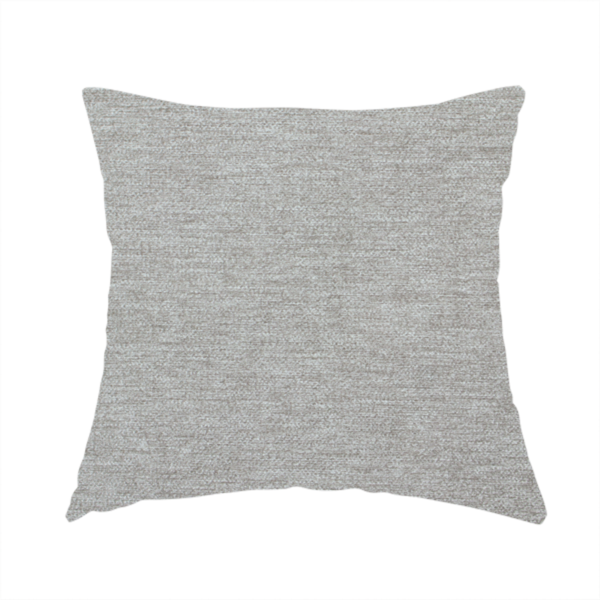 The fabric used to create this handmade cushion is a solid dark beige woven textile with a fine, subtle textured weave.