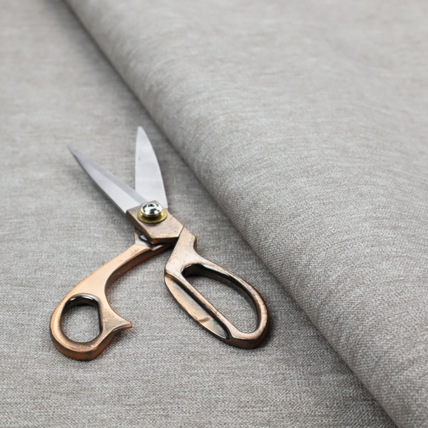 A solid dark beige woven textile with a fine, subtle textured weave.