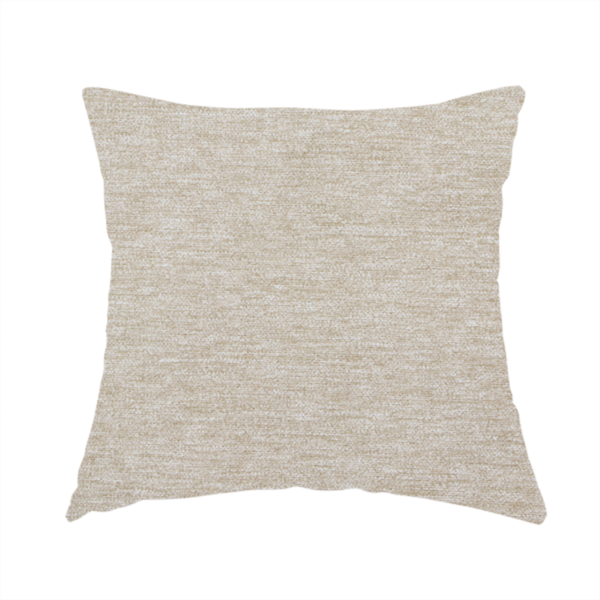 The fabric used to create this handmade cushion is a solid beige woven textile with a fine, subtle textured weave.