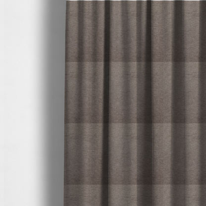 The fabric used to create these made-to-measure curtains is a solid brown woven textile with a fine, subtle textured weave.