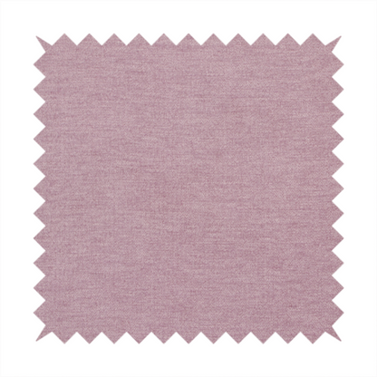A solid pink woven textile with a fine, subtle textured weave.
