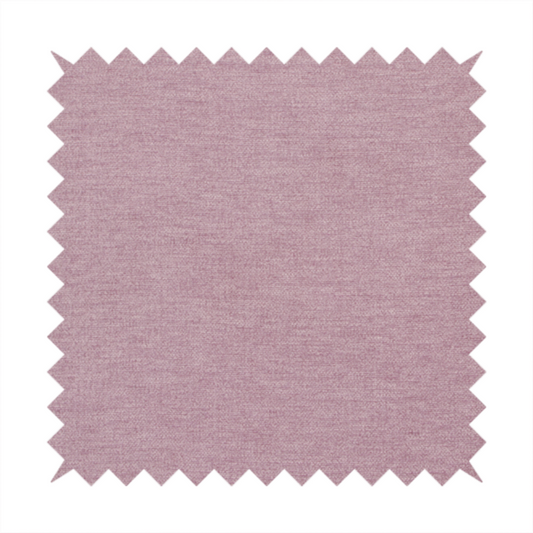 A solid pink woven textile with a fine, subtle textured weave.