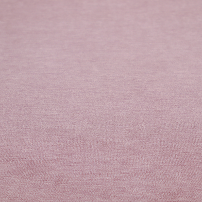 A solid pink woven textile with a fine, subtle textured weave.